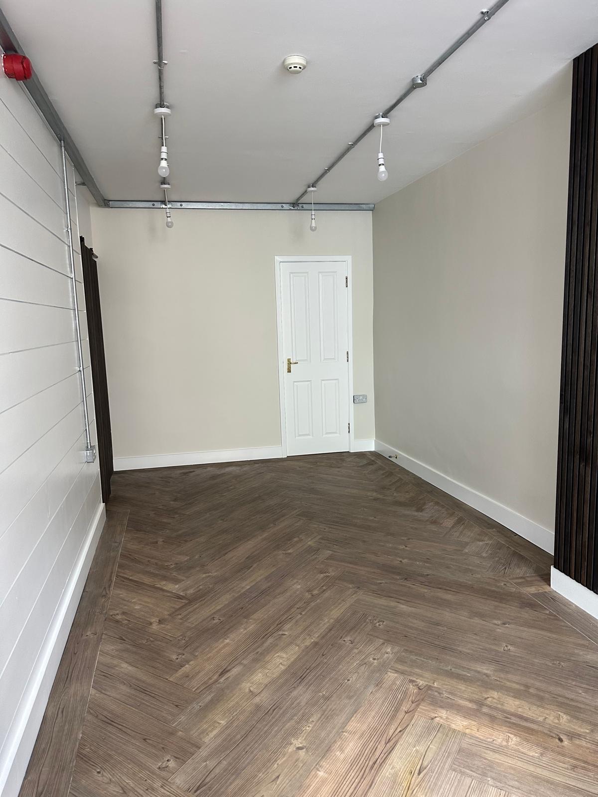 Open-plan refurbishment with herringbone flooring
