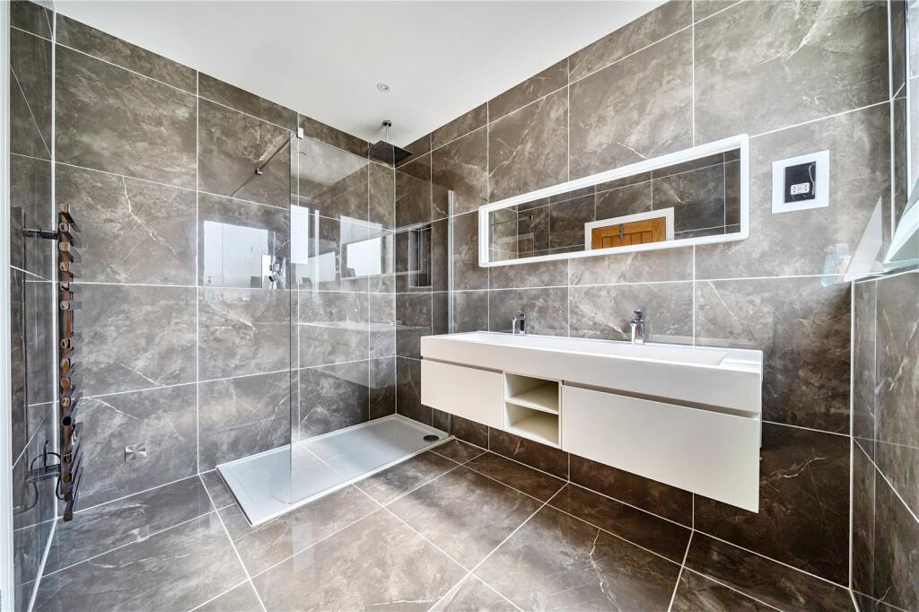 Marble bathroom with twin floating vanity